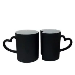 Set 2 tazas mágicas negras con asa en forma de corazón